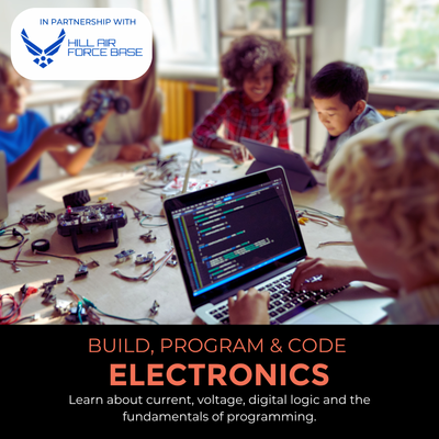 Kids building and coding a marble maze from a STEM project, exploring electronics and technology.