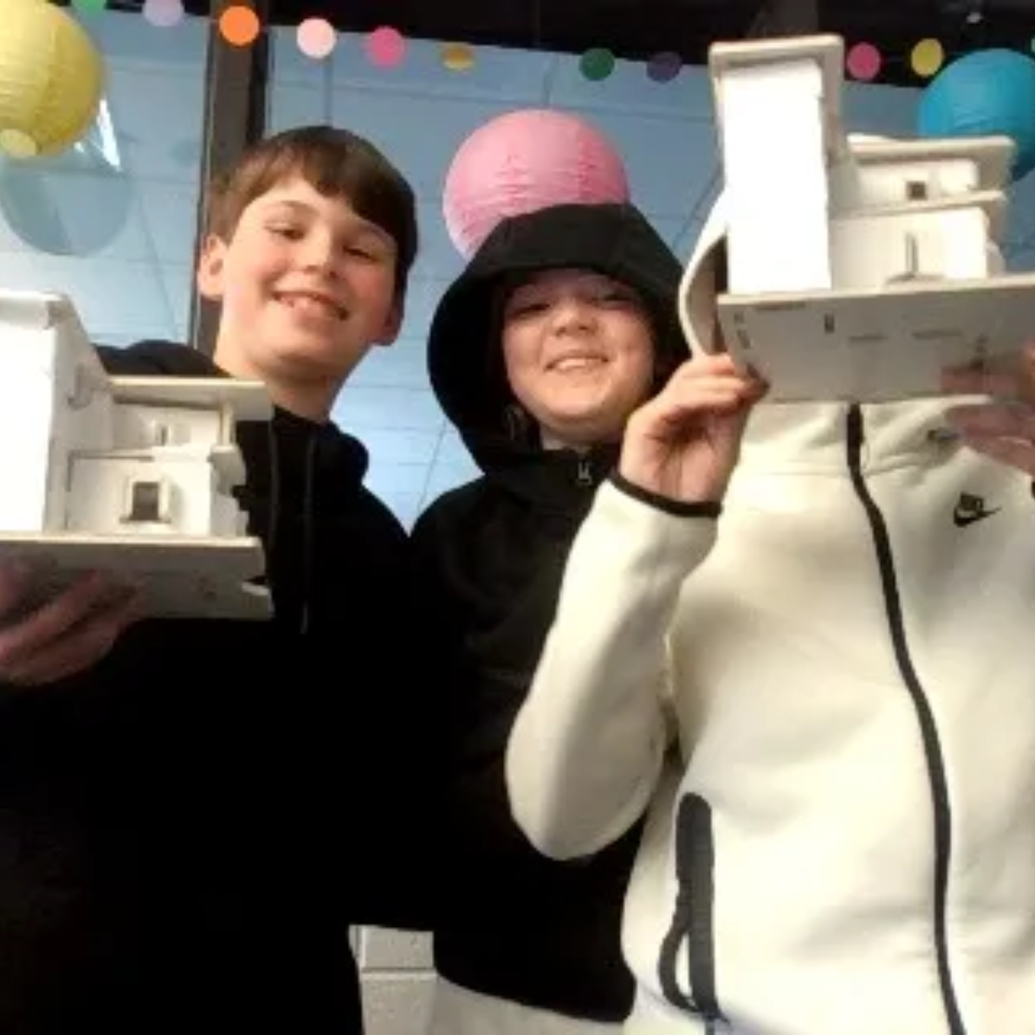 Middle school students engaging with Compass STEM curriculum activities that connect science and technology to real-world applications.