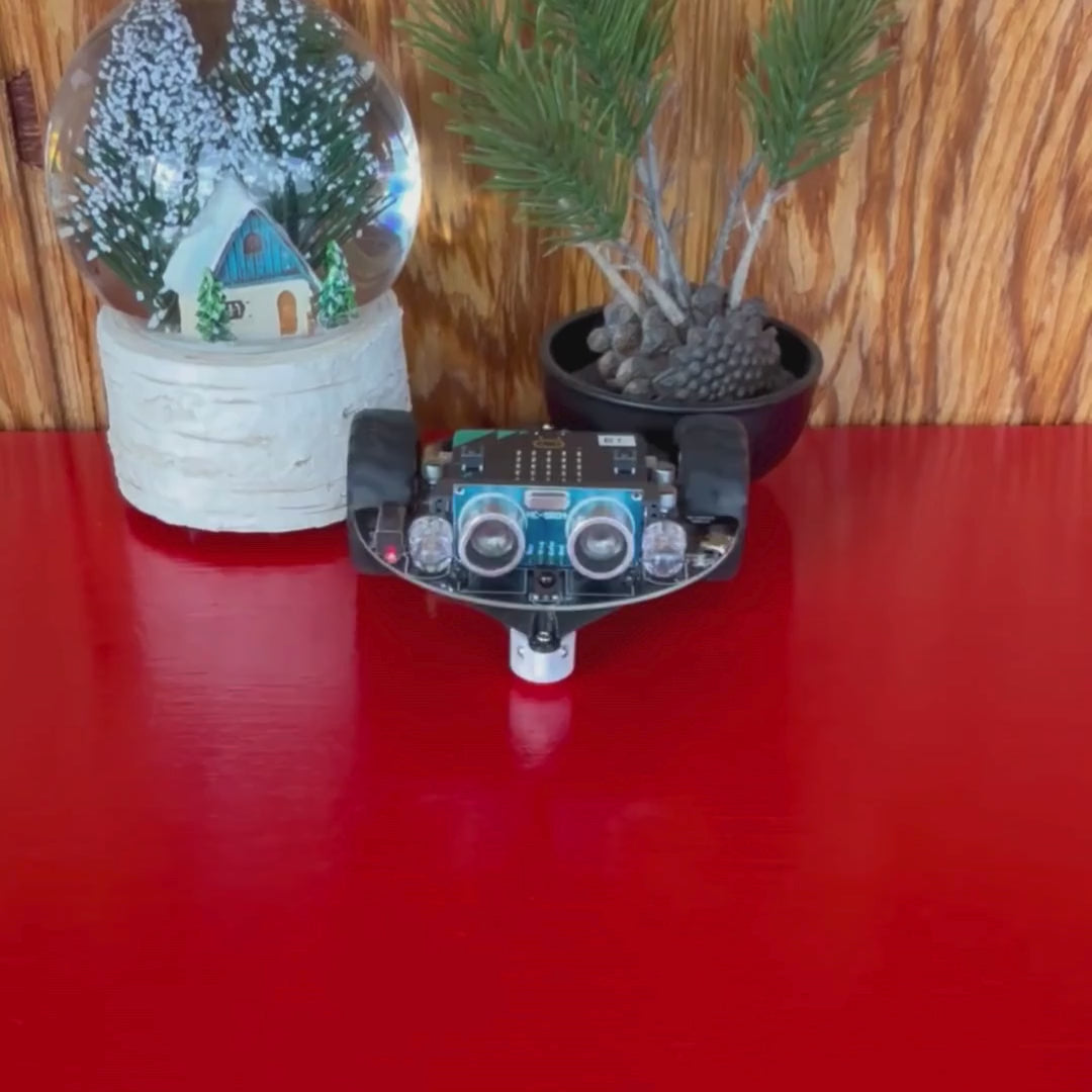 Kids assemble an autonomous vehicle from a STEM project, exploring robotics and engineering skills.